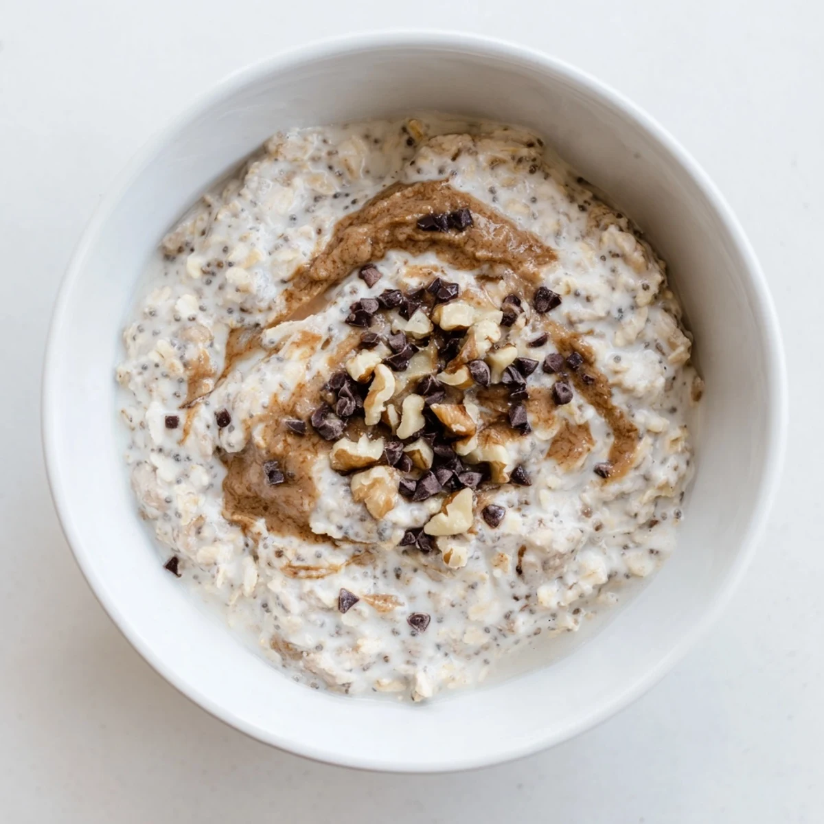 This chilled Cookie Dough Overnight Oats recipe is topped with walnuts and chocolate chips for a satisfying, grab-and-go morning treat.