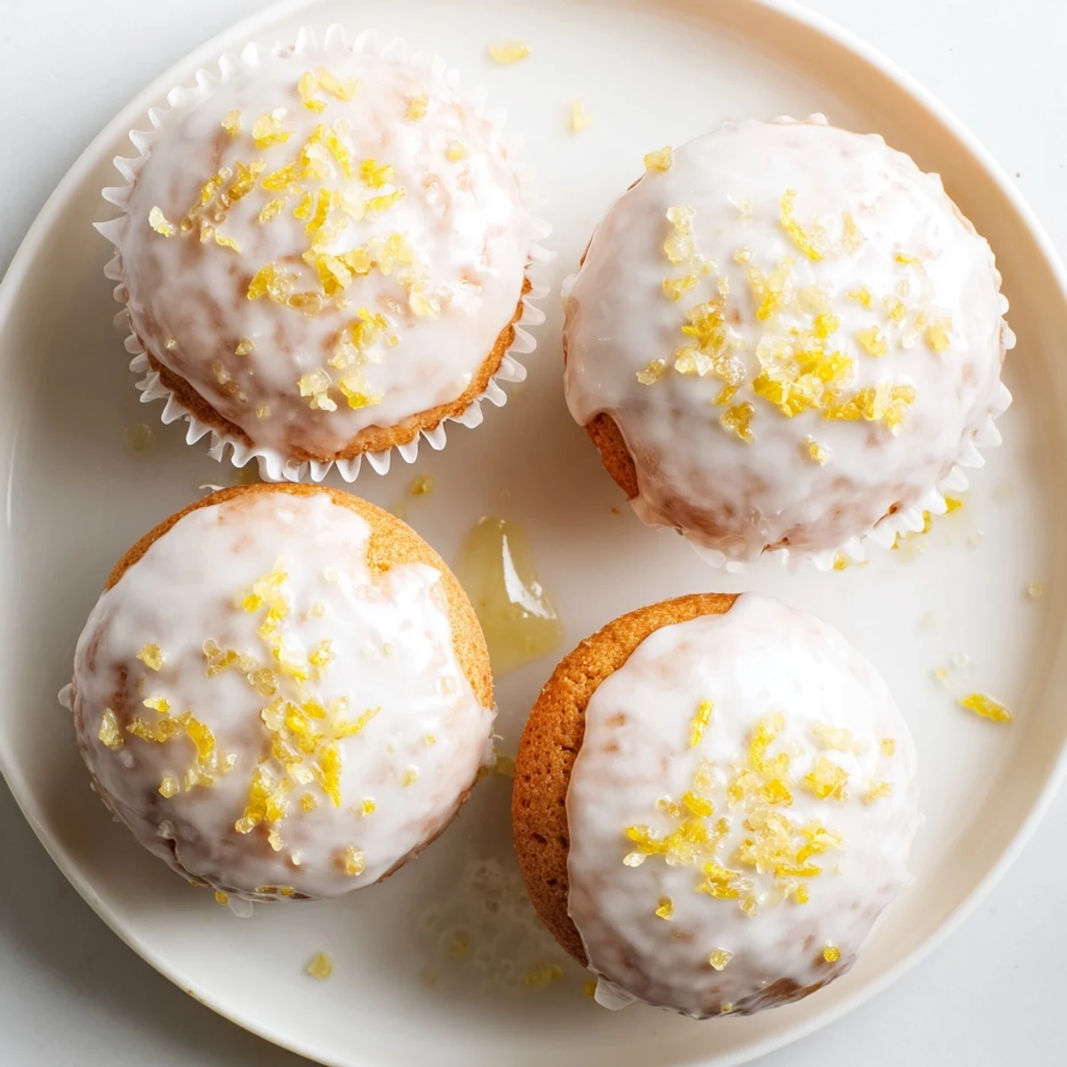 Glazed Lemon Ginger Muffins with shiny citrus glaze, warm crumbs, and bright ginger aroma