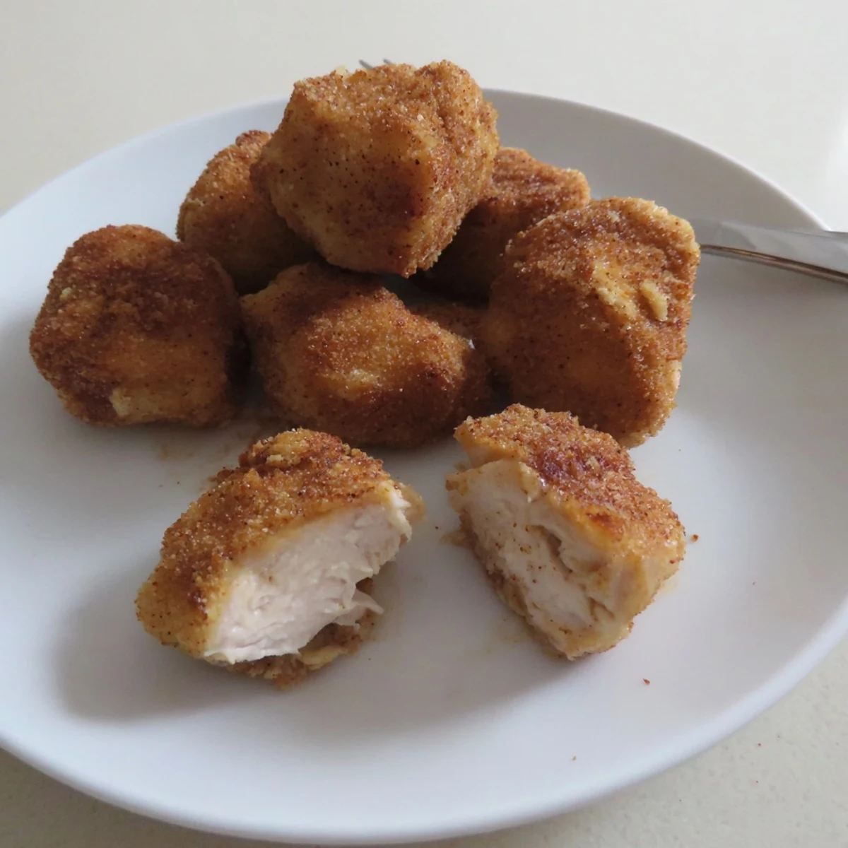 Hot Chicken Bites served straight from fryer, golden edges, tender interior