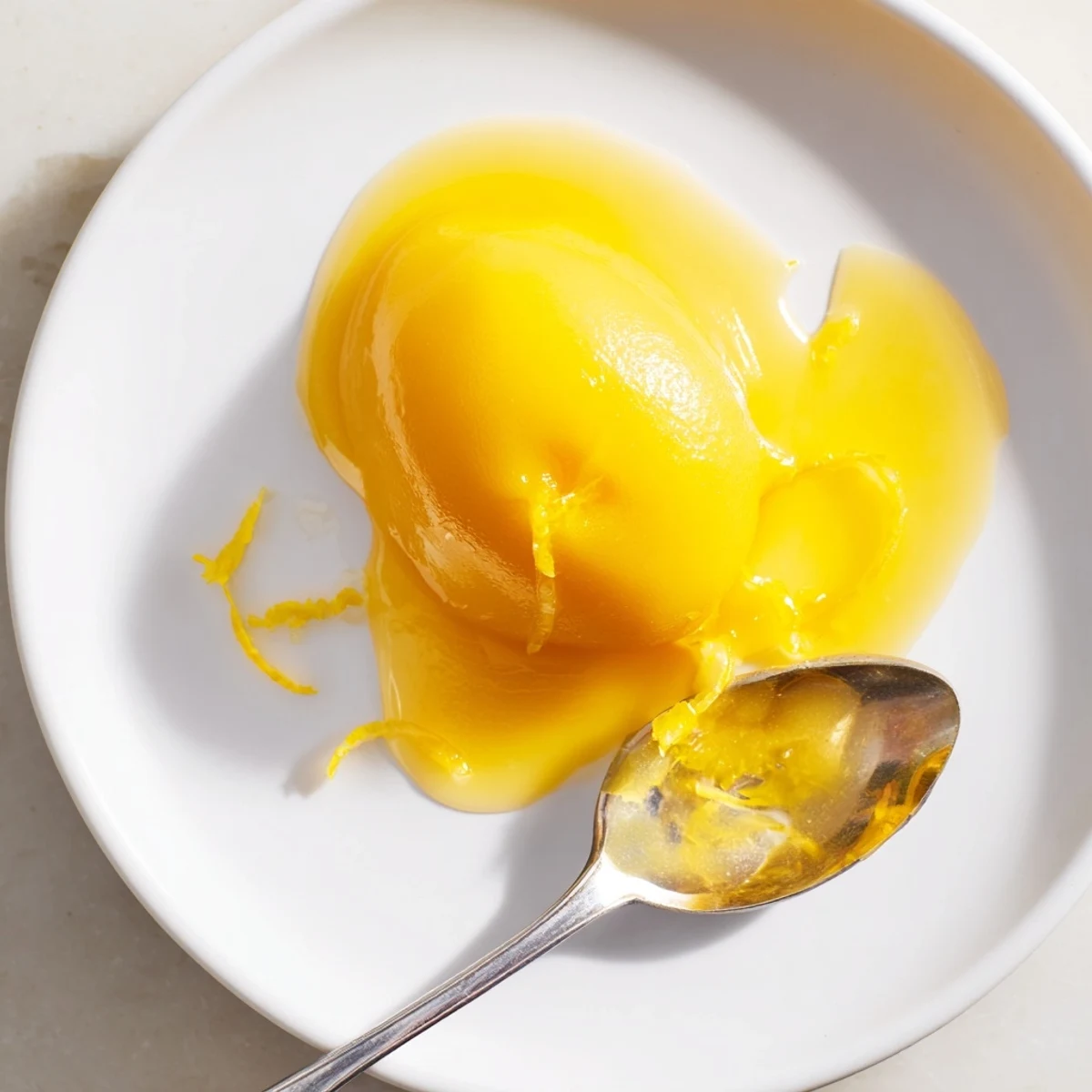 Velvety Lemon Curd Recipe whisked until smooth, perfect for cakes