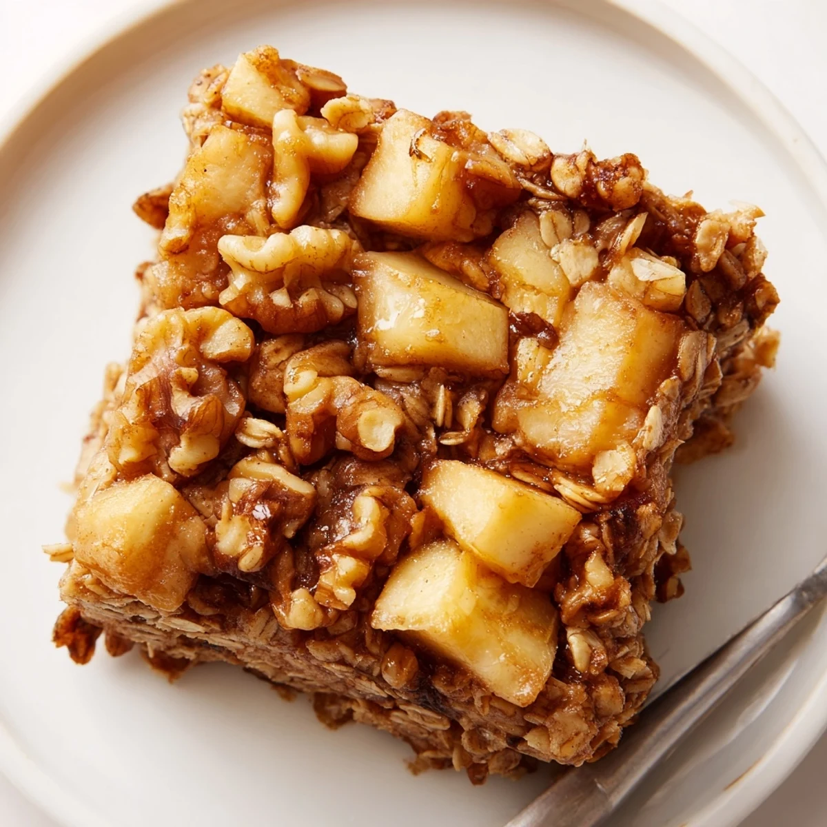 Warm slice of Delicious Apple Cinnamon Oatmeal Bake Recipe For Mornings, cinnamon aroma